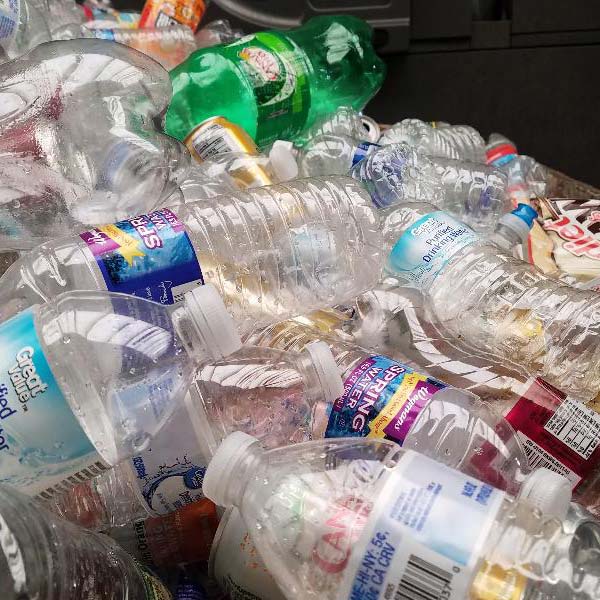 Plastic soda and water bottles piled in a heap collected by ALPCO Recycling in Macedon, NY